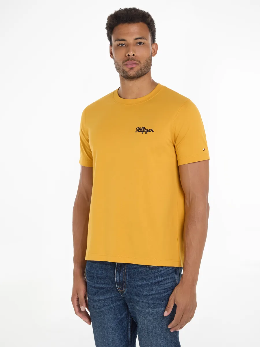 

Футболка Tommy Hilfiger "HILFIGER CHAINSTITCH TEE" с фирменным принтом на груди, желтый