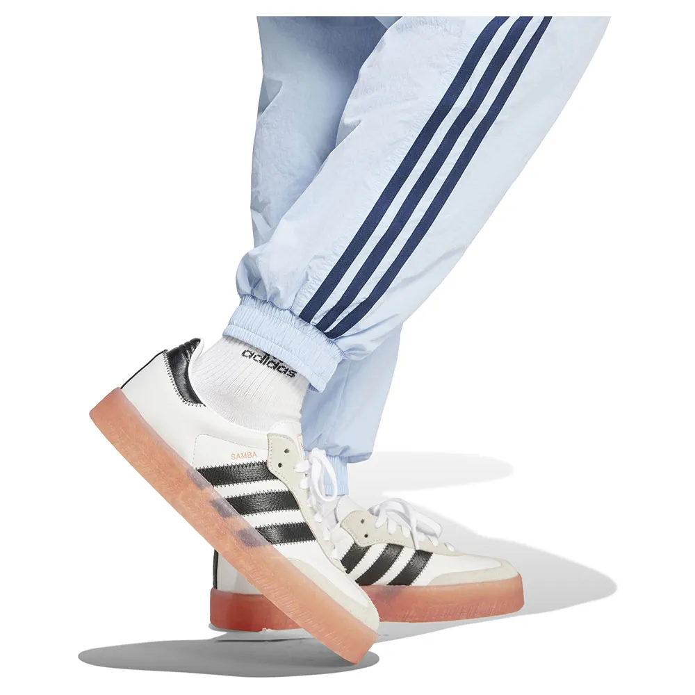 Спортивные брюки adidas Originals Adicolor 3 Stripes Woven Nylon Cuffed, синий — фото 3