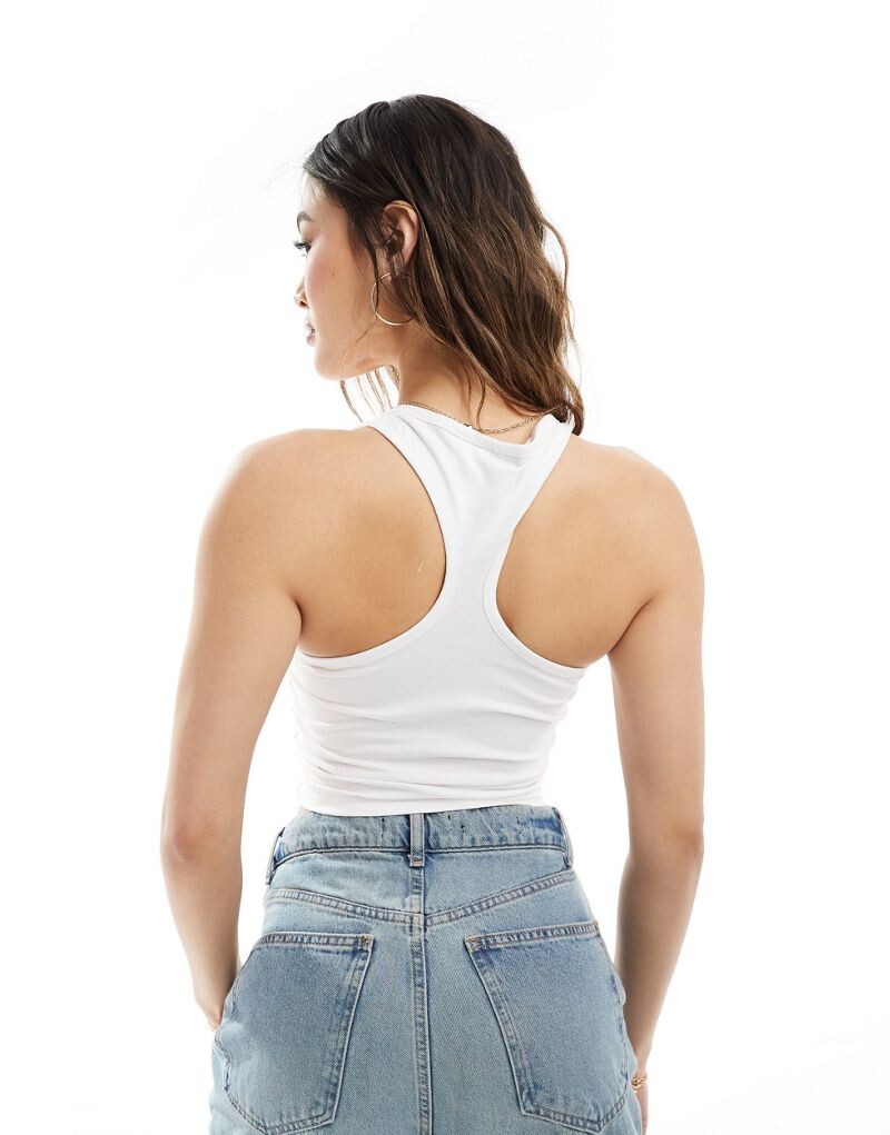 

Белая майка-борцовка с вырезами ASOS DESIGN