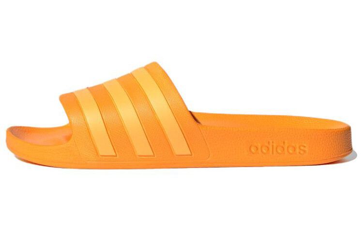 

Шлепанцы серии ADILETTE унисекс желтые Adidas