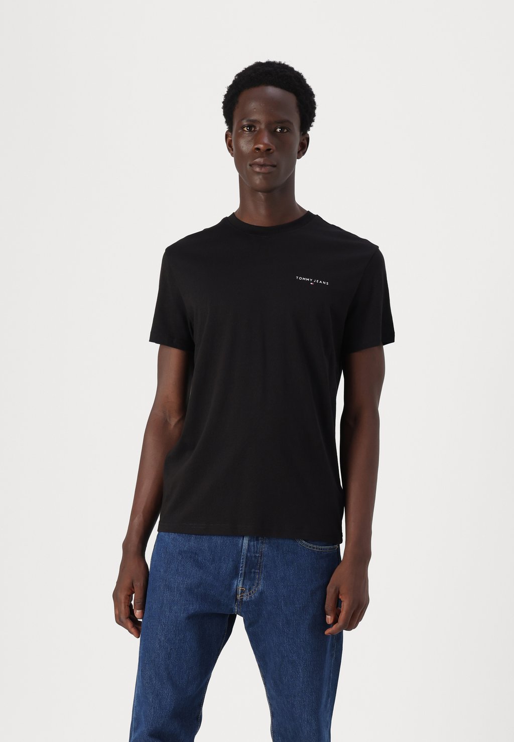 

Базовая футболка SLIM LINEAR CHEST TEE Tommy Jeans, черный