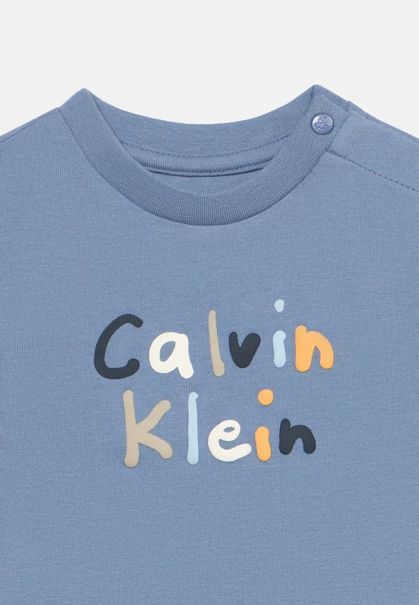 Короткие шорты унисекс Calvin Klein Jeans, Light Blue — фото 4