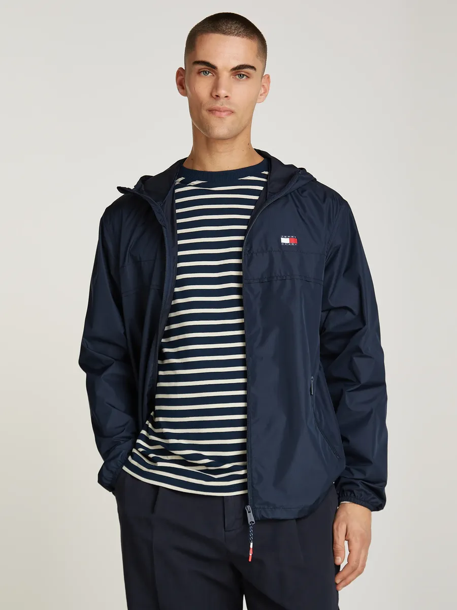

Верхняя куртка Tommy Jeans "TJM LW CHICAGO JACKET", с капюшоном, с тисненым логотипом, синий