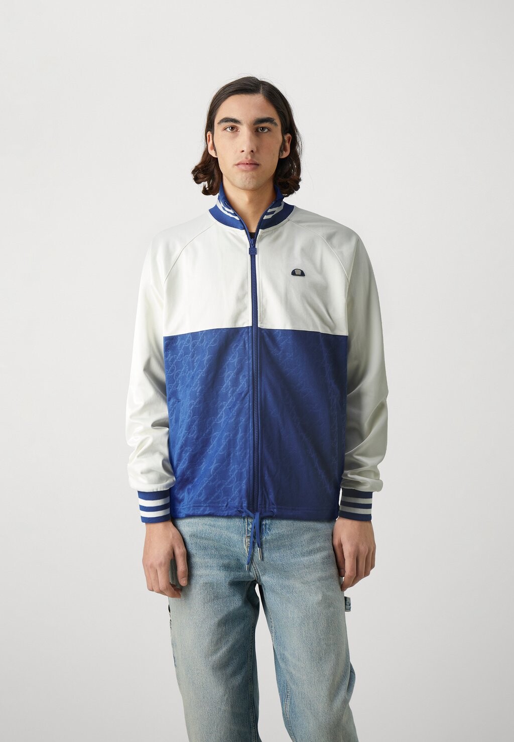 

Куртка тренировочная SOLDO TRACK UNISEX Ellesse, цвет off white/navy