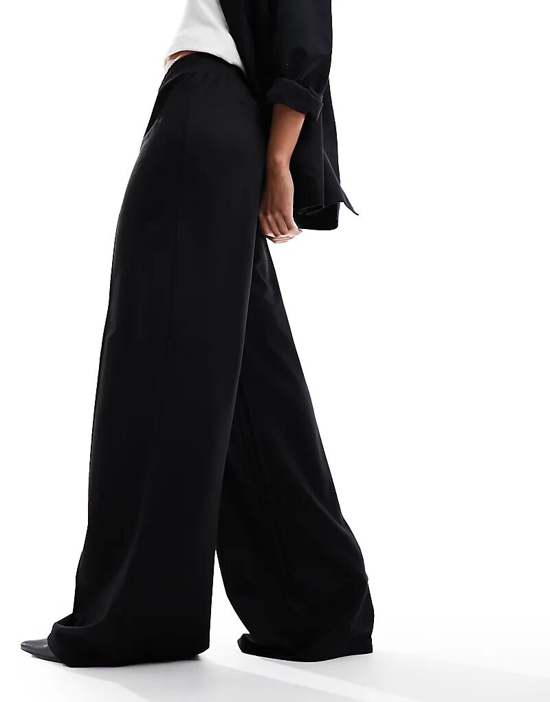 

Брюки свободного кроя черного цвета ASOS DESIGN