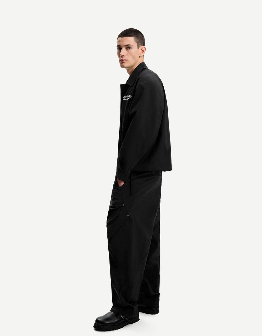 

Супермешковатые технические брюки со складками Bershka, черный