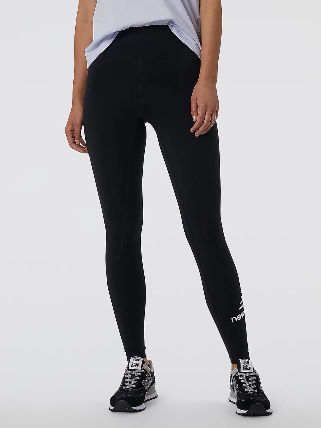 

Тайтсы New Balance ESSENTIALS STACKED, черный