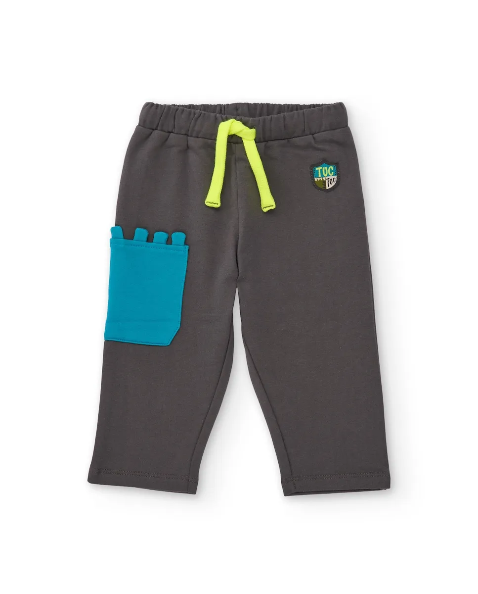 

Детские длинные велюровые штаны серого цвета с декоративным синим карманом Tuc tuc