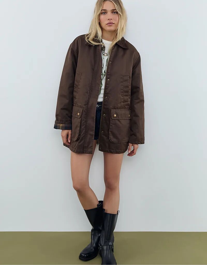 

Вощеная парка Stradivarius коричневого цвета с множеством карманов