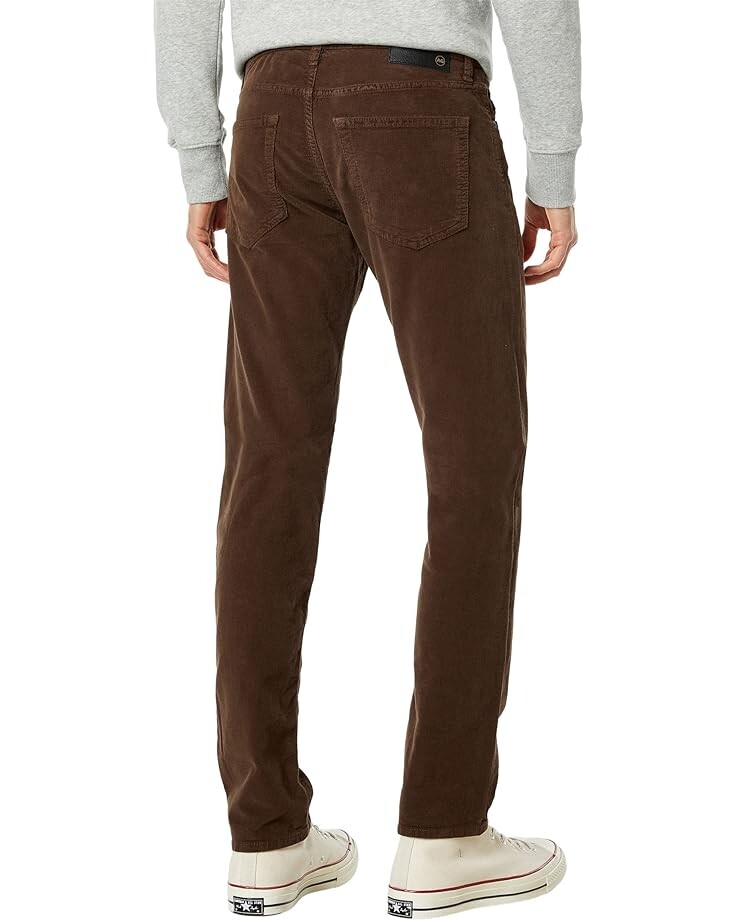 

Джинсы AG Tellis Slim in Sulfur Rich Oak, цвет Sulfur Rich Oak