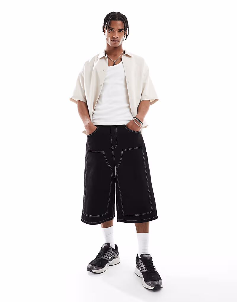 

Плотницкие шорты ASOS DESIGN удлиненной формы черного цвета с контрастной строчкой
