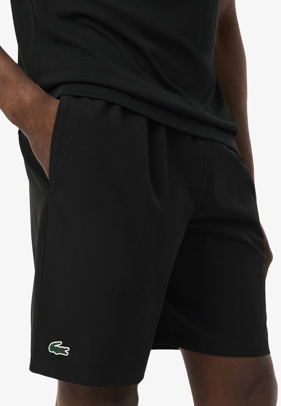 Спортивные шорты Lacoste Sport Sports shorts, Noir Jaune Fi/Black — фото 3