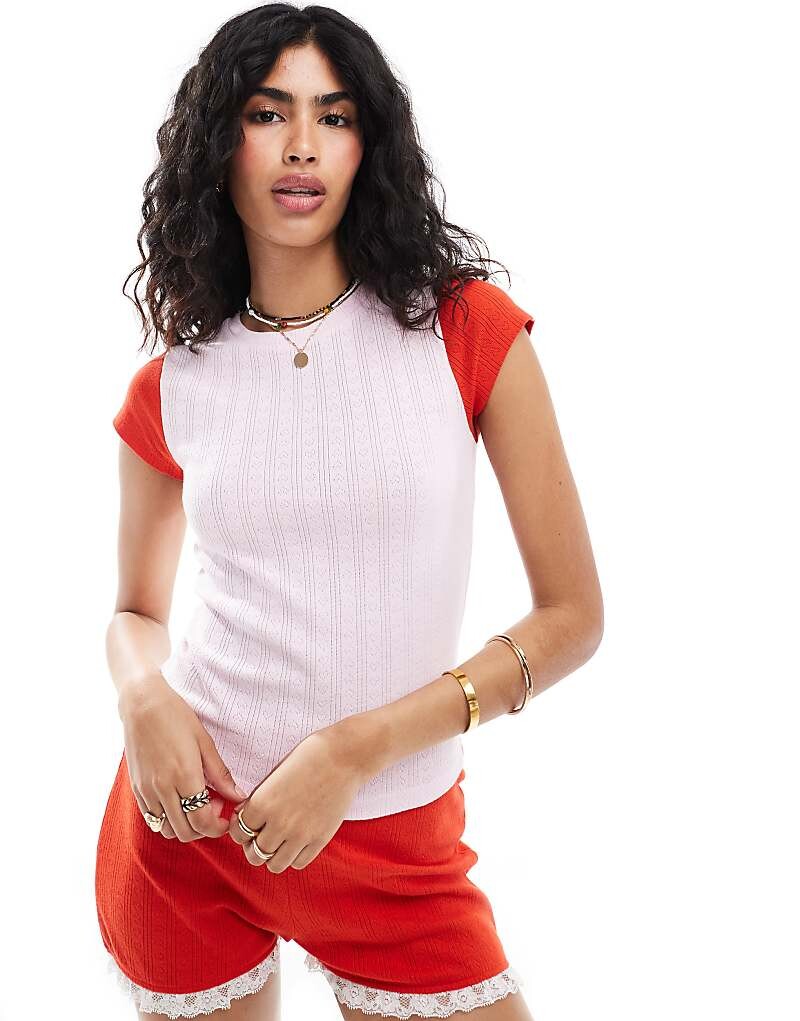 

Розовая и красная детская футболка реглан ASOS DESIGN