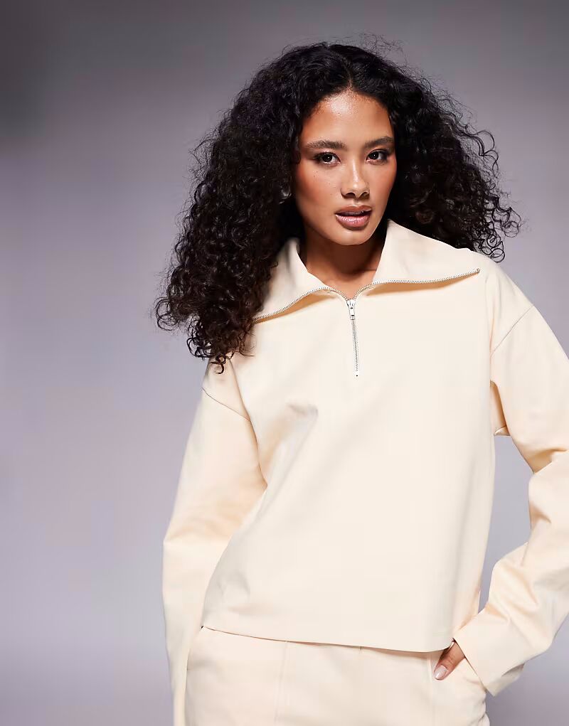 

Топ-комбинезон ASOS DESIGN с застежкой-молнией до середины бедра в цвете пахты