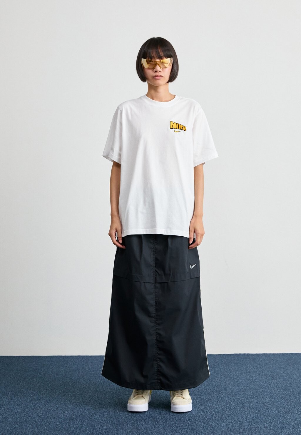 

Принт на футболке TEE VINTAGE Nike, белый