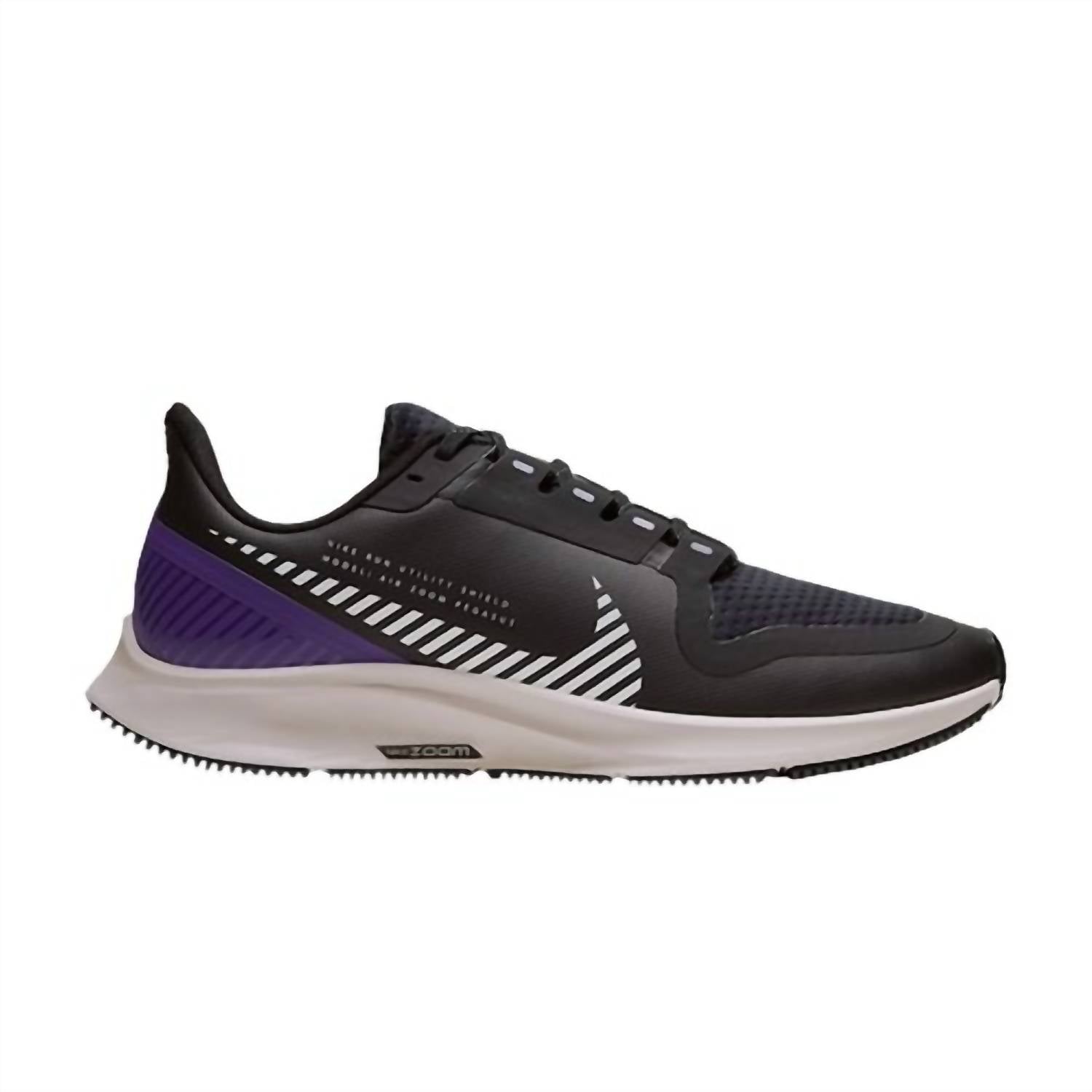Женские кроссовки Air Zoom Pegasus 36 Shield в цвете черный/серебристый/песочный/фиолетовый Nike
