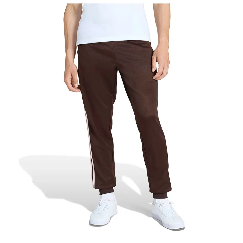 

Брюки adidas Originals SST, коричневый