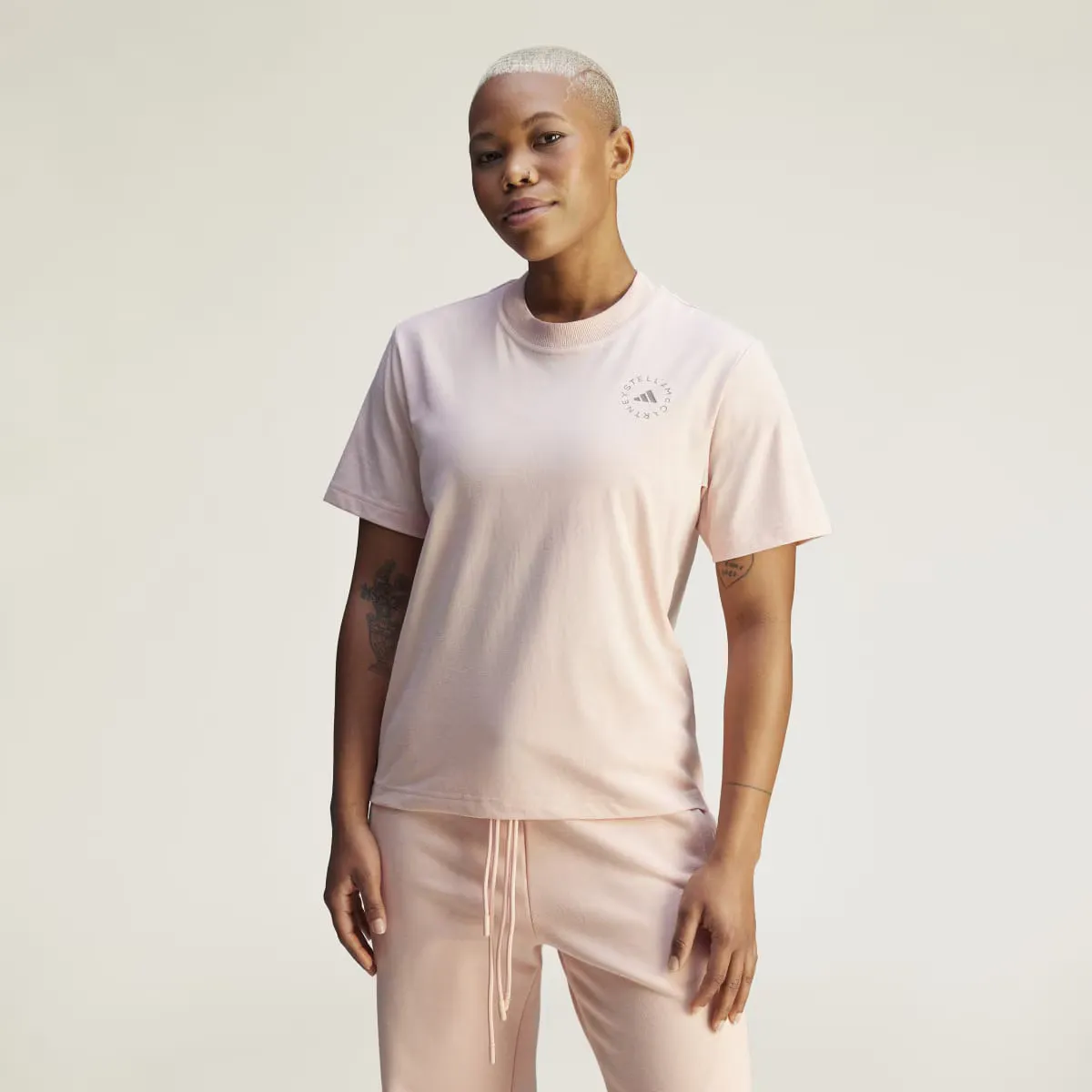 

Adidas by Stella McCartney TrueCasuals Обычная спортивная женская футболка, розовый