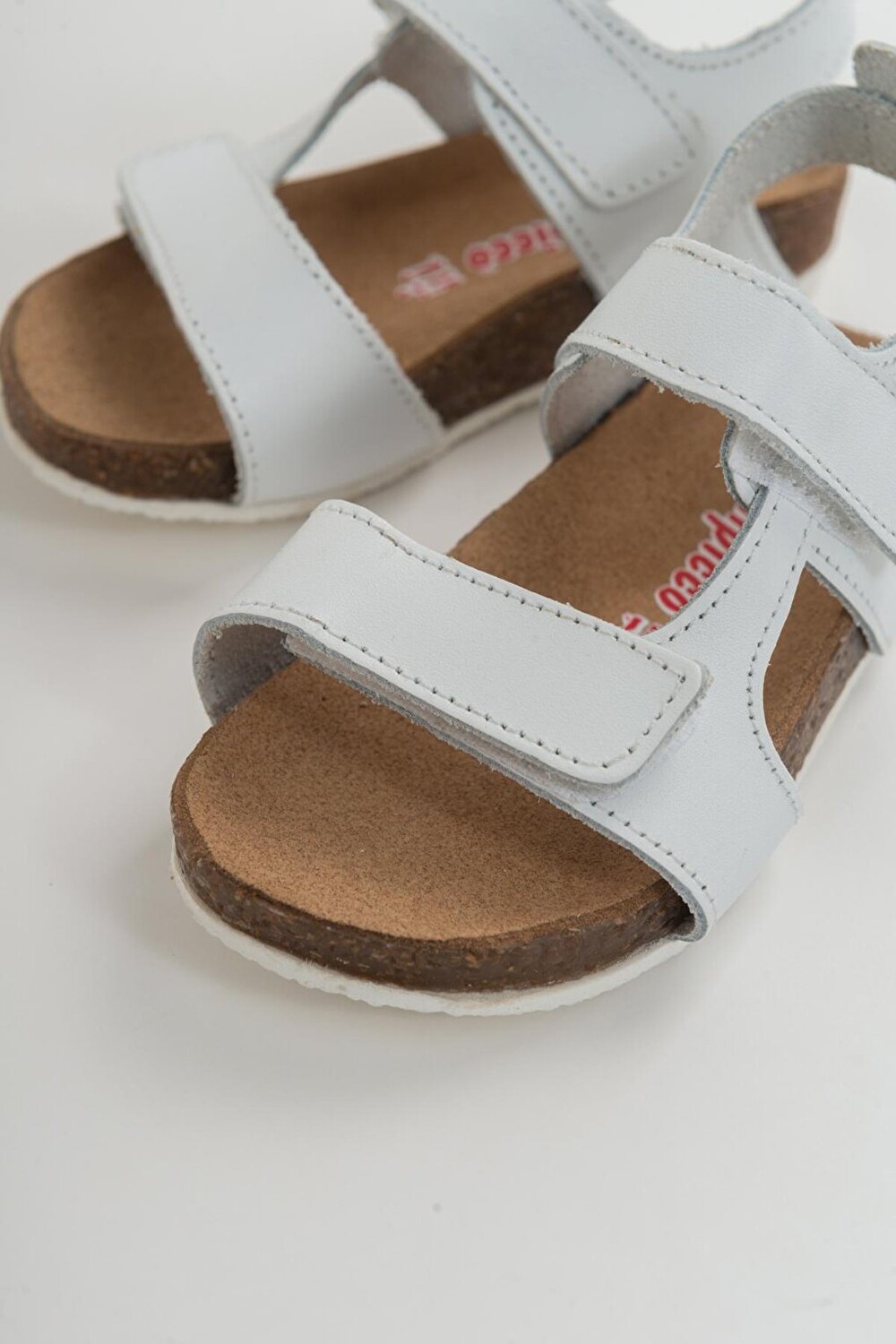 

Белые кожаные детские сандалии с ортопедической опорой для мальчиков MİNİPİCCO