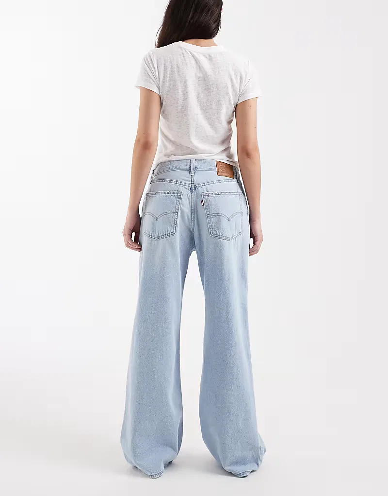 Свободные джинсы-клеш Levis с рваными элементами Levi's, светло-голубой — фото 2