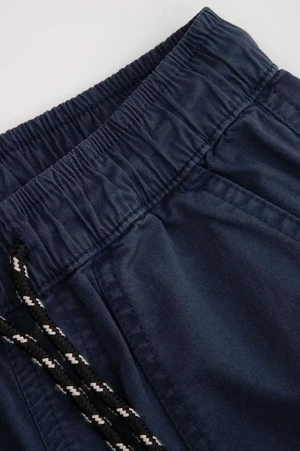 Брюки детские из хлопка slim fit Coccodrillo, синий — фото 3