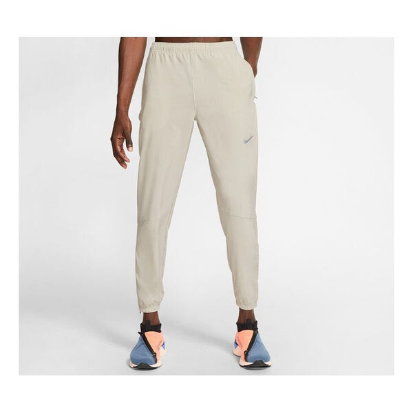 

Брюки essential woven running long pants cone basic silver Nike, серебряный