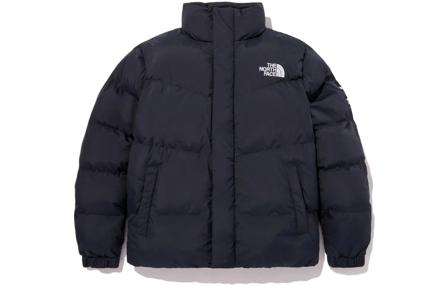 

Стеганая куртка унисекс темно-синяя The North Face, темно-синий