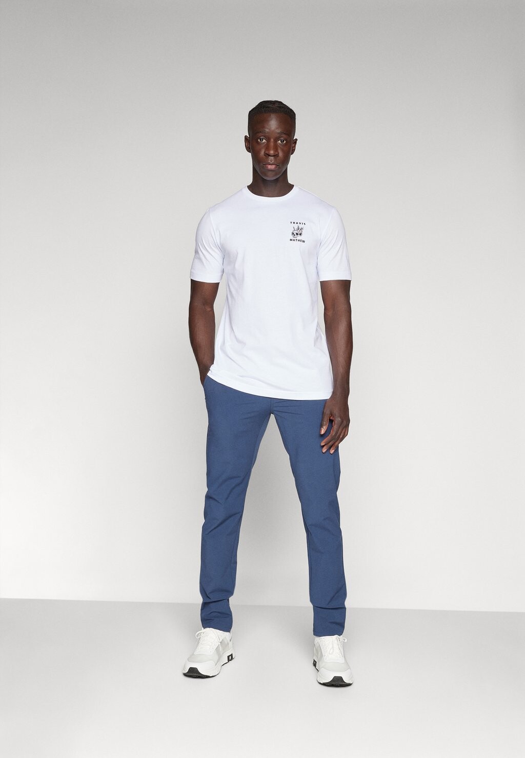 

Брюки TECH CHINO TravisMathew, синий