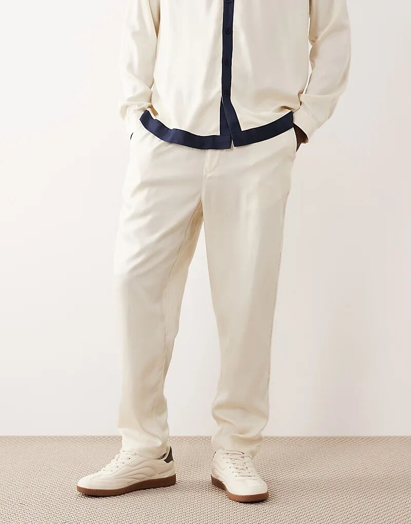 

Зауженные брюки ASOS DESIGN кремового цвета