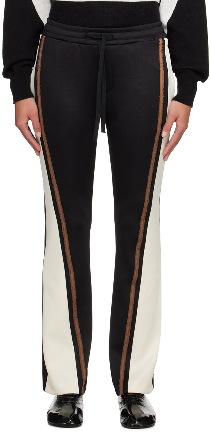 

Черно-белые спортивные брюки с расклешенной лентой Kijun