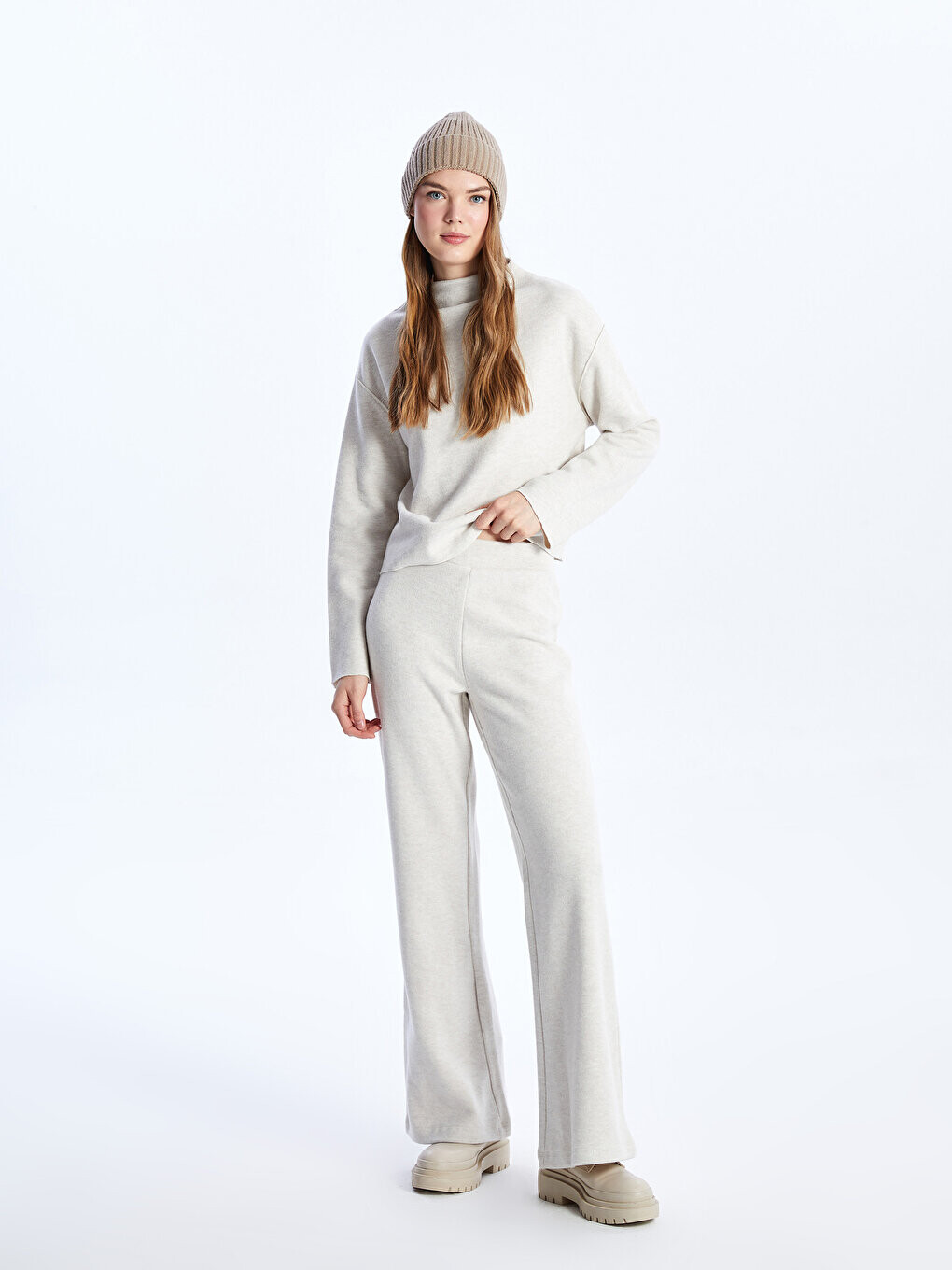 

Прямые женские трикотажные брюки с широкими штанинами и эластичной резинкой на талии LCW Casual, бежевый меланж