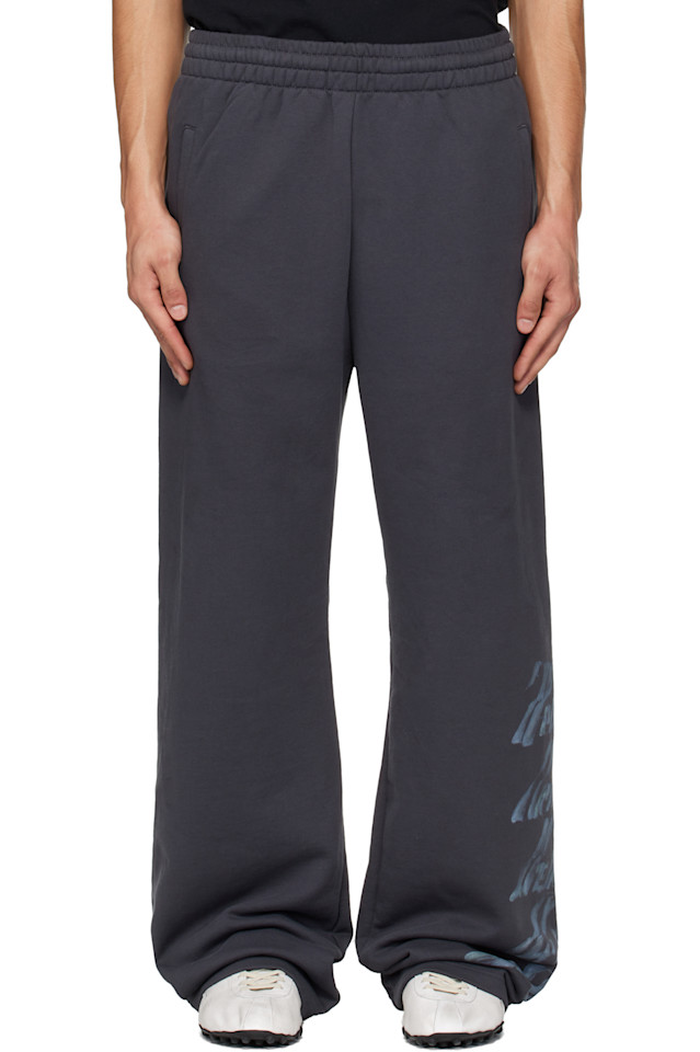 

We11Done Серые спортивные штаны с несколькими логотипами 'we11done'