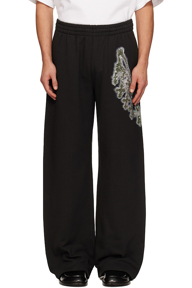 

Спортивные штаны с крестообразными цепочками We11Done, черный