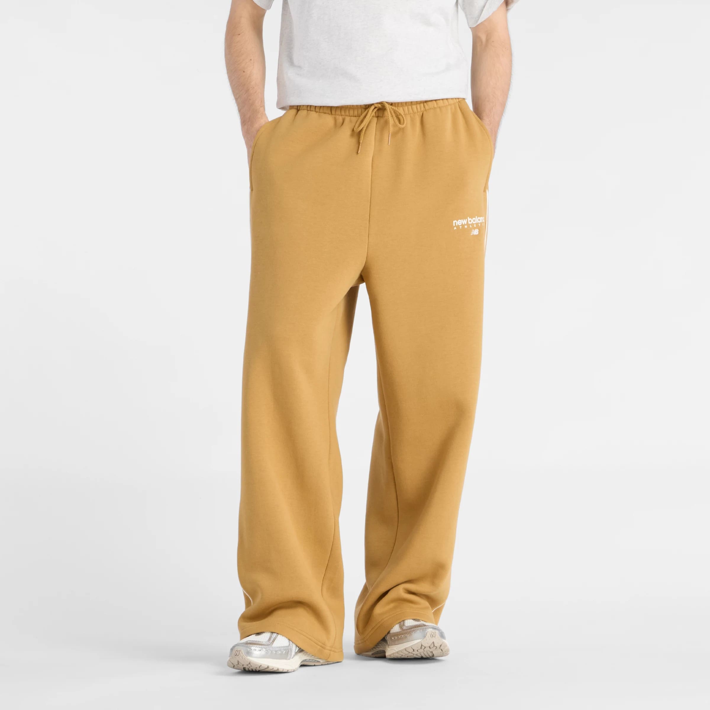 

New balance Широкие брюки 'Trackside' в цвете Saffron