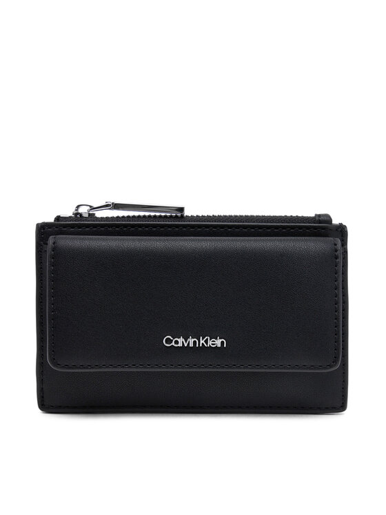 

Большой женский кошелек Ck Must Zip Flap Cardholder K60K612941 Calvin Klein, черный