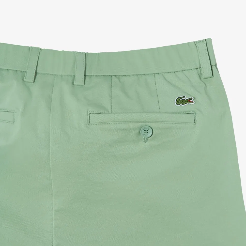 Мужские чиносы Tapered Fit светло-зелёные от Lacoste — фото 4