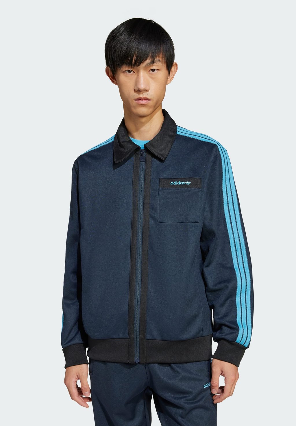 

Тренировочная куртка adidas Originals, темно-синий