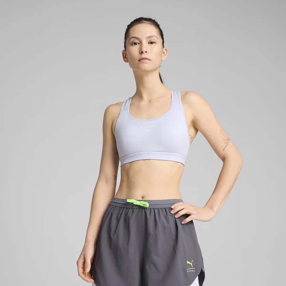 

W PUMA x HYROX Mid Impact Bra Женский спортивный бюстгальтер PUMA, синий