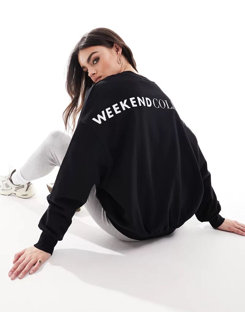 

Черный свободный свитшот с большим логотипом на спине ASOS Weekend Collective
