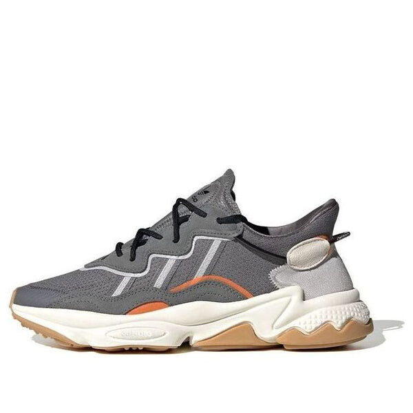 

Кроссовки оригиналы ozweego Adidas, серый