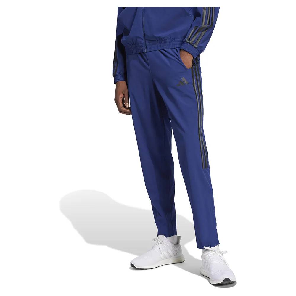 

Джоггеры adidas House Of Tiro Woven, синий