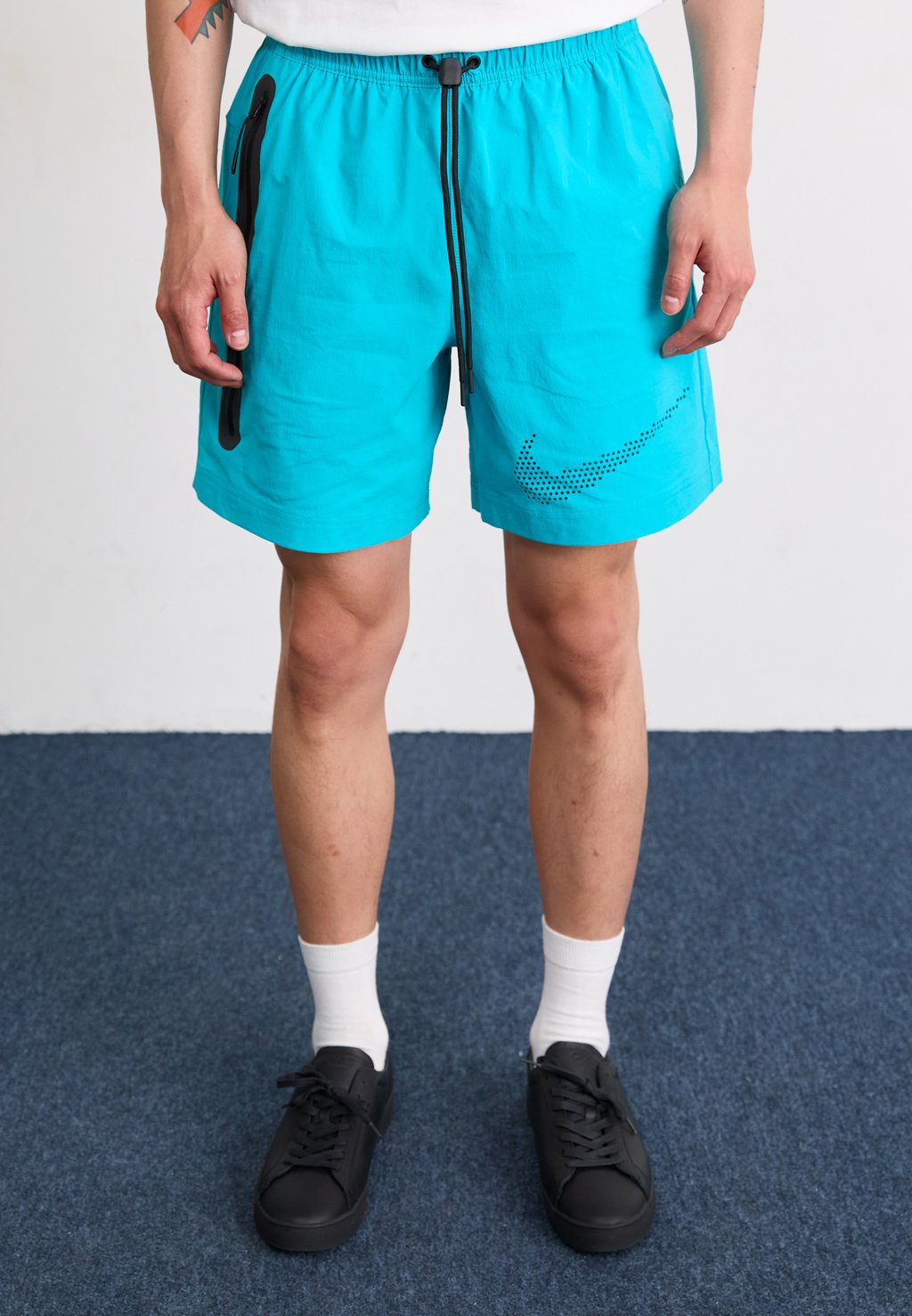 

Шорты TECH Nike Sportswear, бирюзовый
