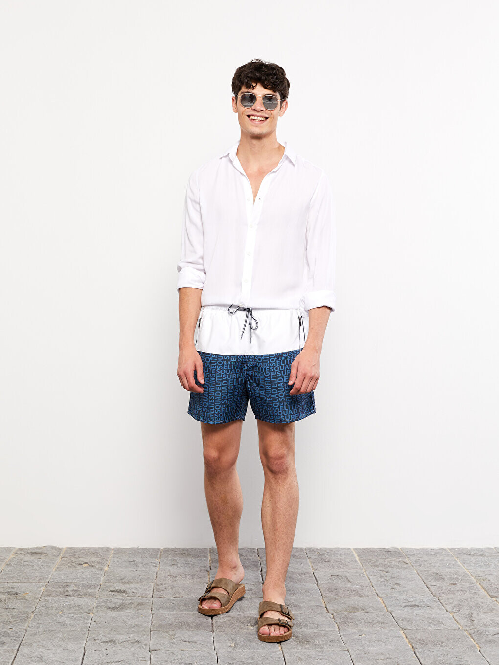 

Короткие мужские шорты для плавания с цветными блоками LCW SWIMWEAR, темно-синий с принтом