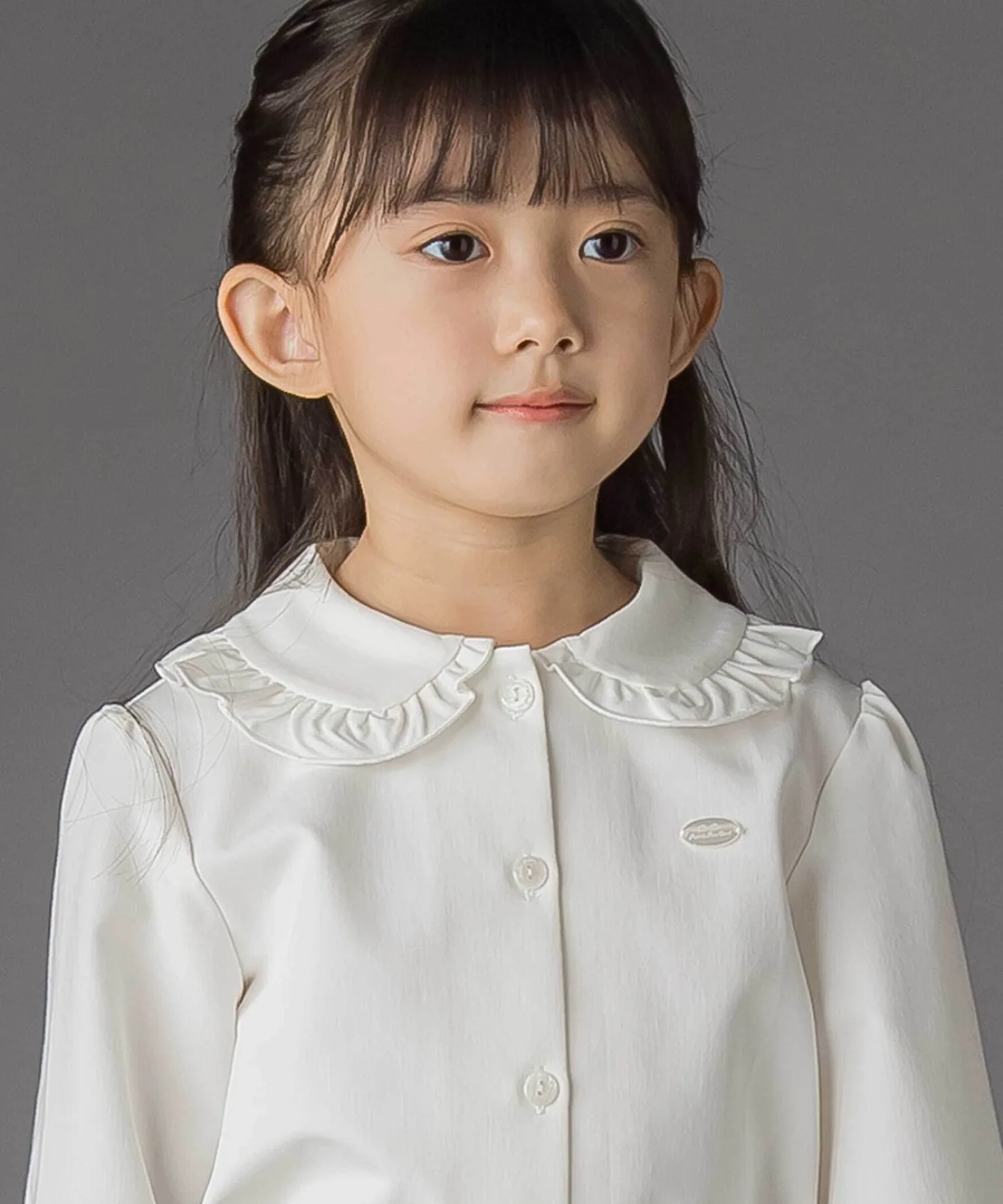 Детская блузка BeBe Petits Pois Vert с воротником-жабо — фото 3