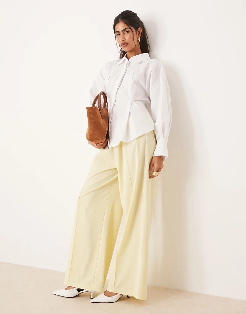 

Спортивные брюки ASOS DESIGN с декоративными боковыми швами лимонного цвета