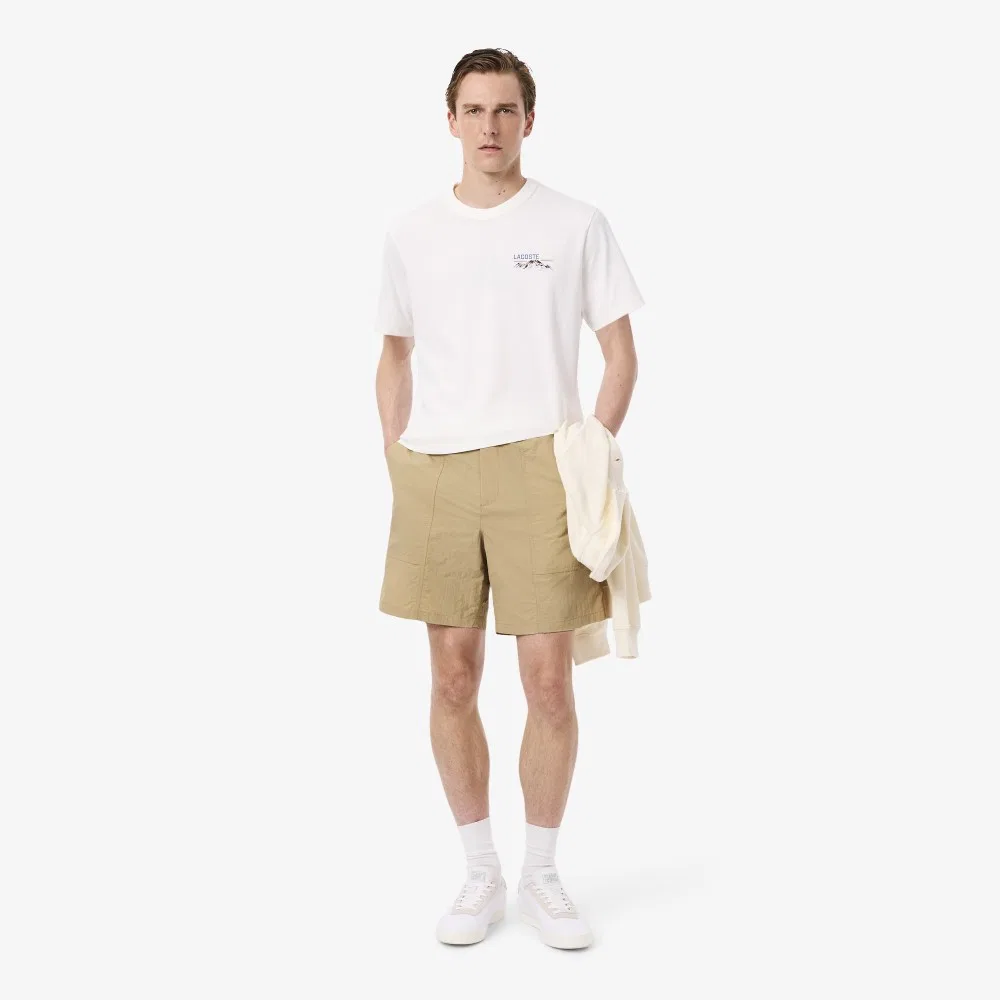 Мужские шорты с декоративной строчкой бежевые от Lacoste
