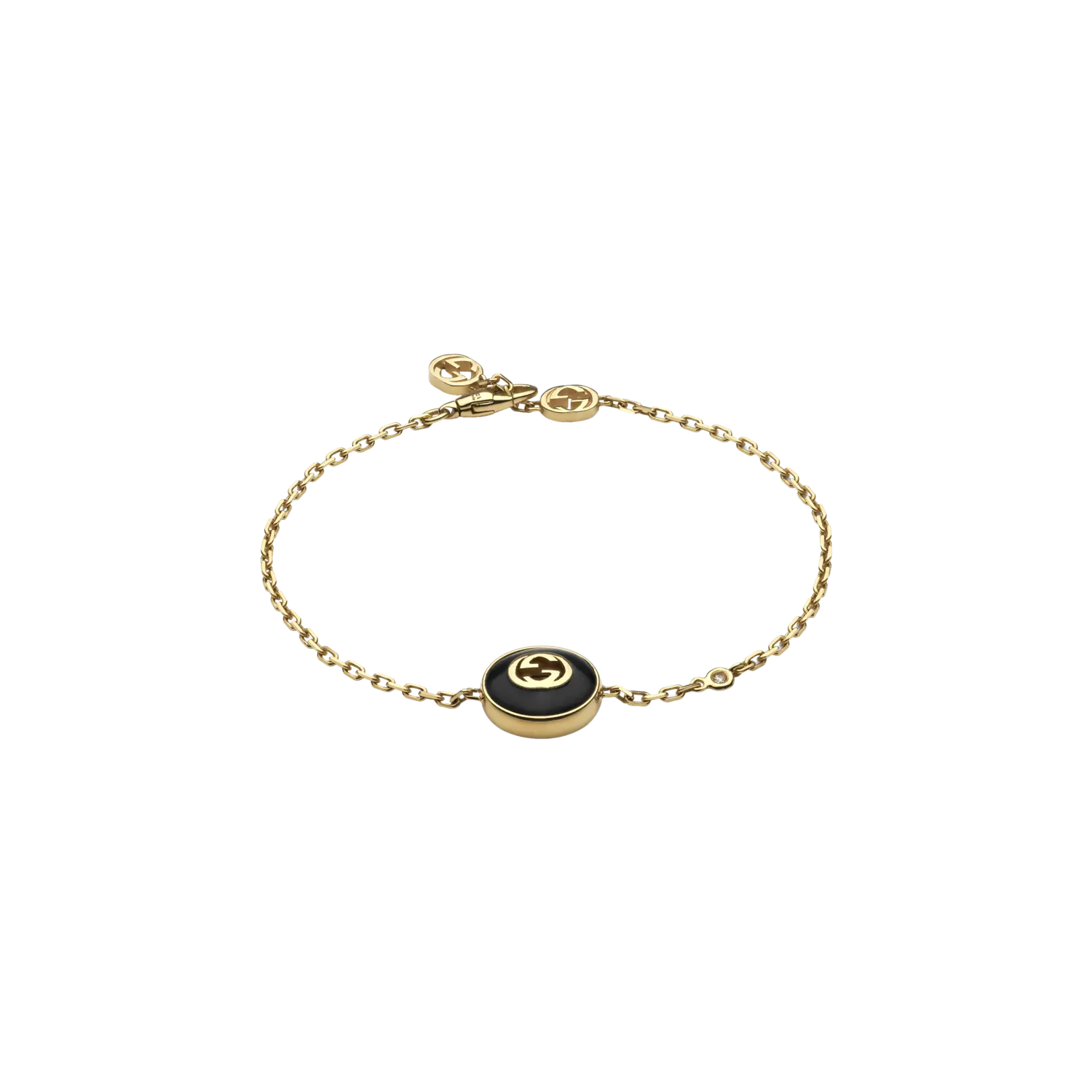 

Браслет Gucci Interlocking из желтого золота и оникса
