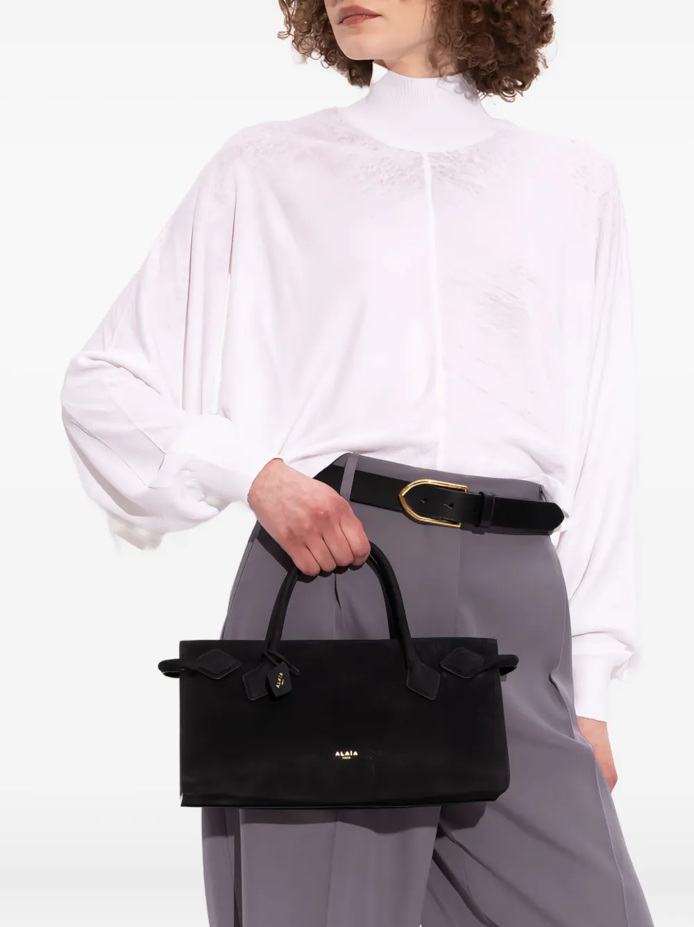 

Маленькая сумка-тоут из замши с узлом Alaïa, черный