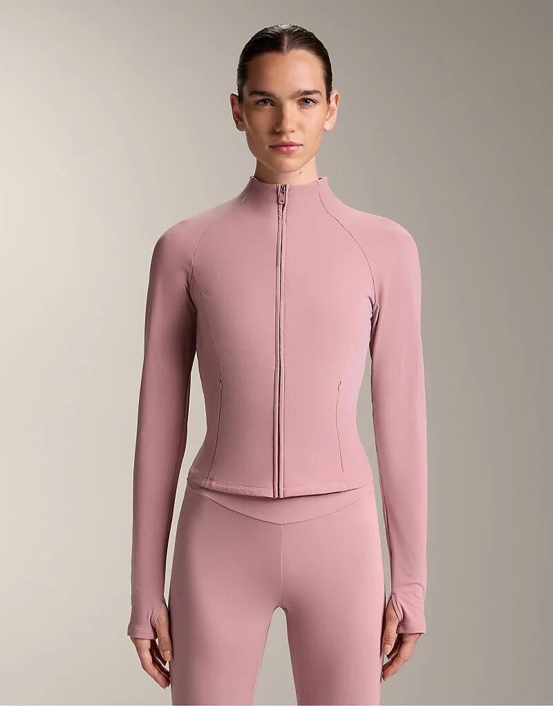 

Легкая теплая куртка OYSHO в розовом цвете