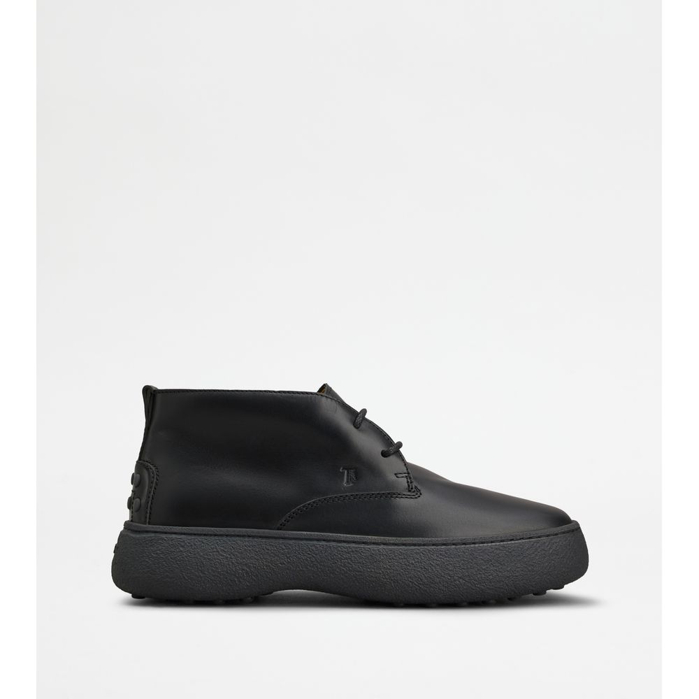 

Ботинки Tod's WG Heritage Desert из кожи, черный